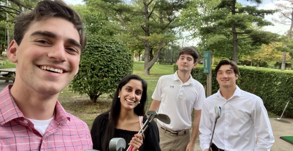 2022 summer interns golfing